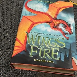 Wings of Fire: Escaping Peril Hardcover Book